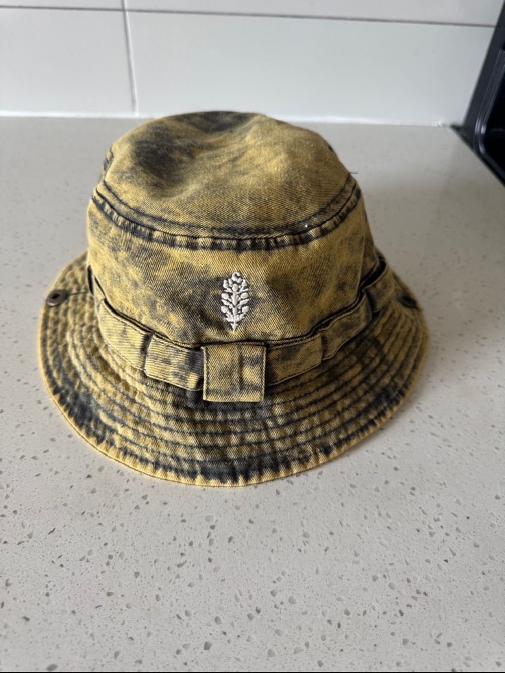 FP Movement by Free People Yellow and Black Washed Bucket Hat with Leaf Pin